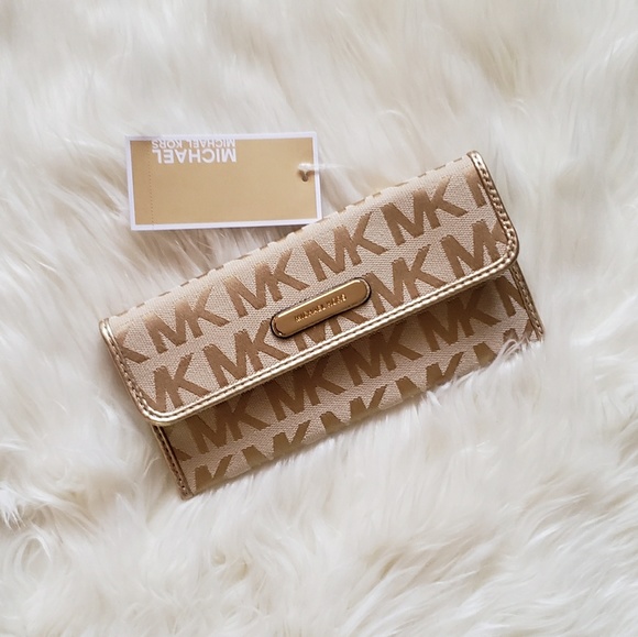 Michael Kors Handbags - NWT Michael Kors Slim Wallet!